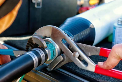 Pipe repair service using professional plumbing tools in Largo, Florida
